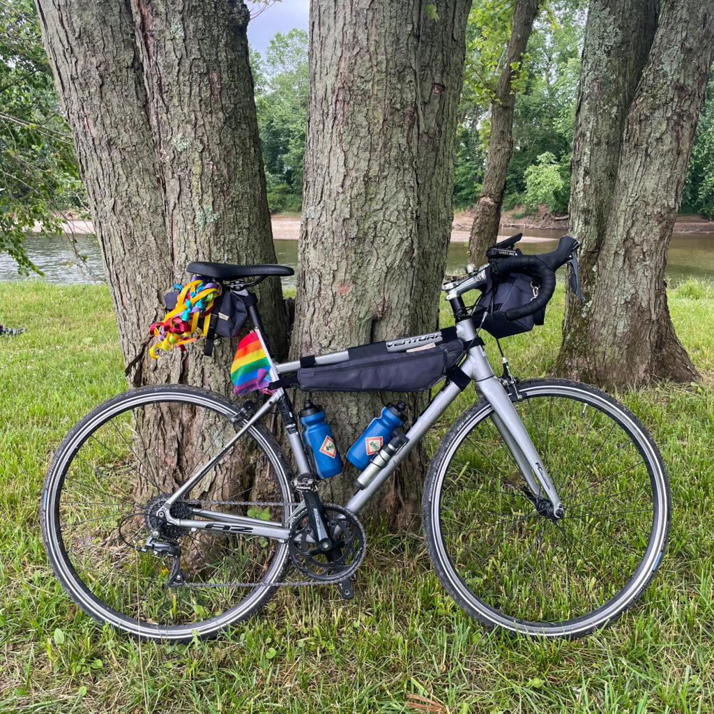 Jamis road bike with rainbow pride flag